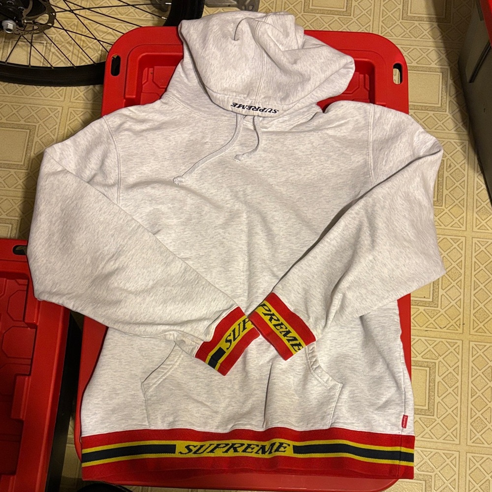 Supreme Light Gray Hoodie with Red and Yellow Trim